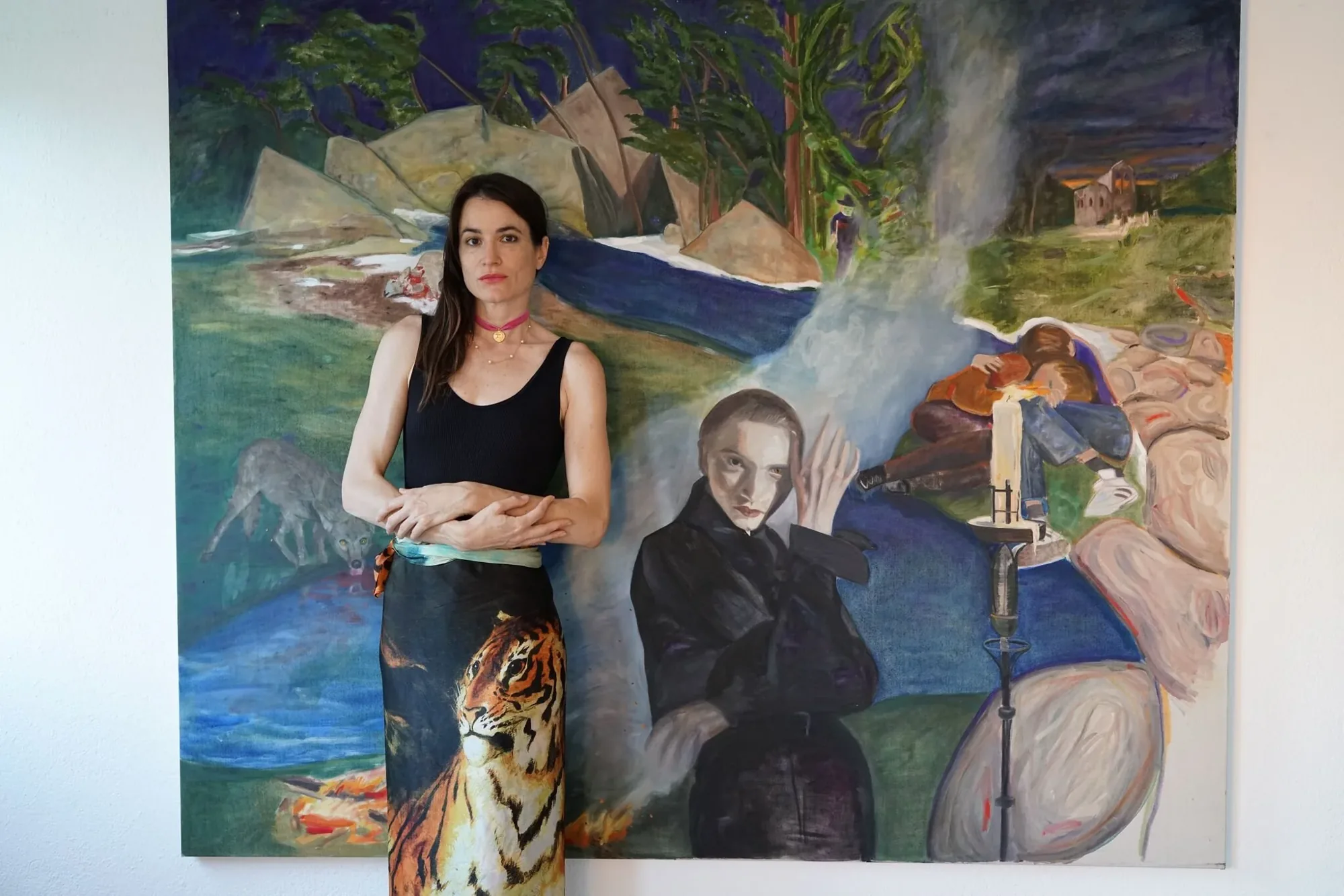 Jill Mulleady standing in front of a large painting